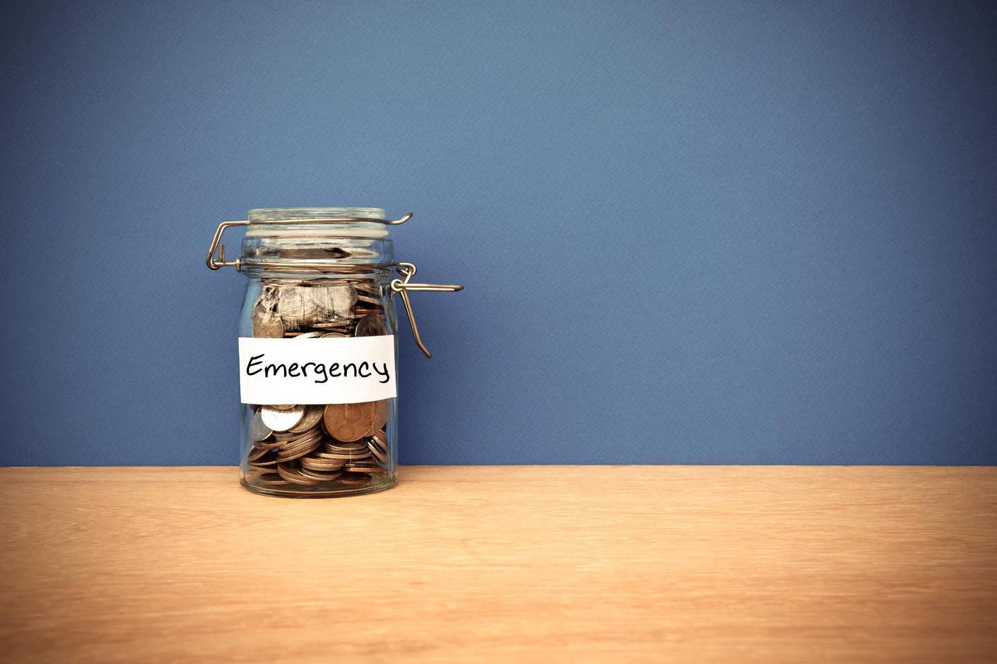 A portion from every pay cheque should be set aside into a separate savings account for an emergency fund. Getty Images